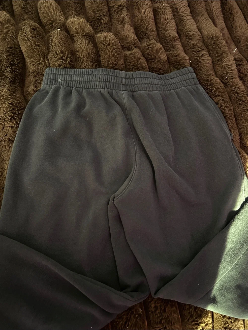Nike Kids Black Sweatpants with White Swoosh